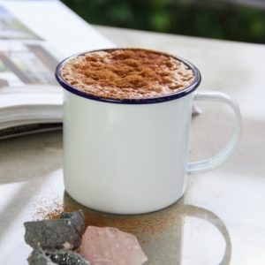 Mug of dandelion coffee on a table top