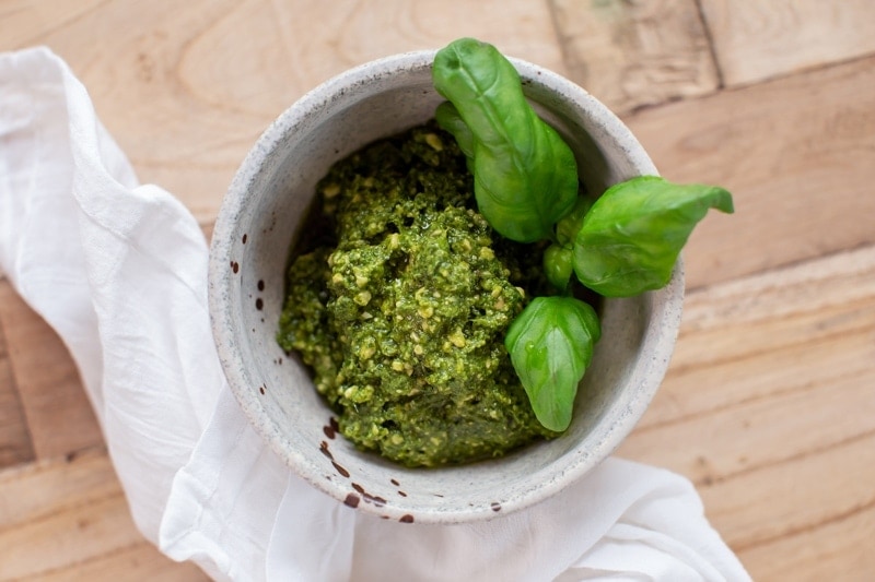 Bowl of fresh basil pesto to use in the broccoli pasta recipe