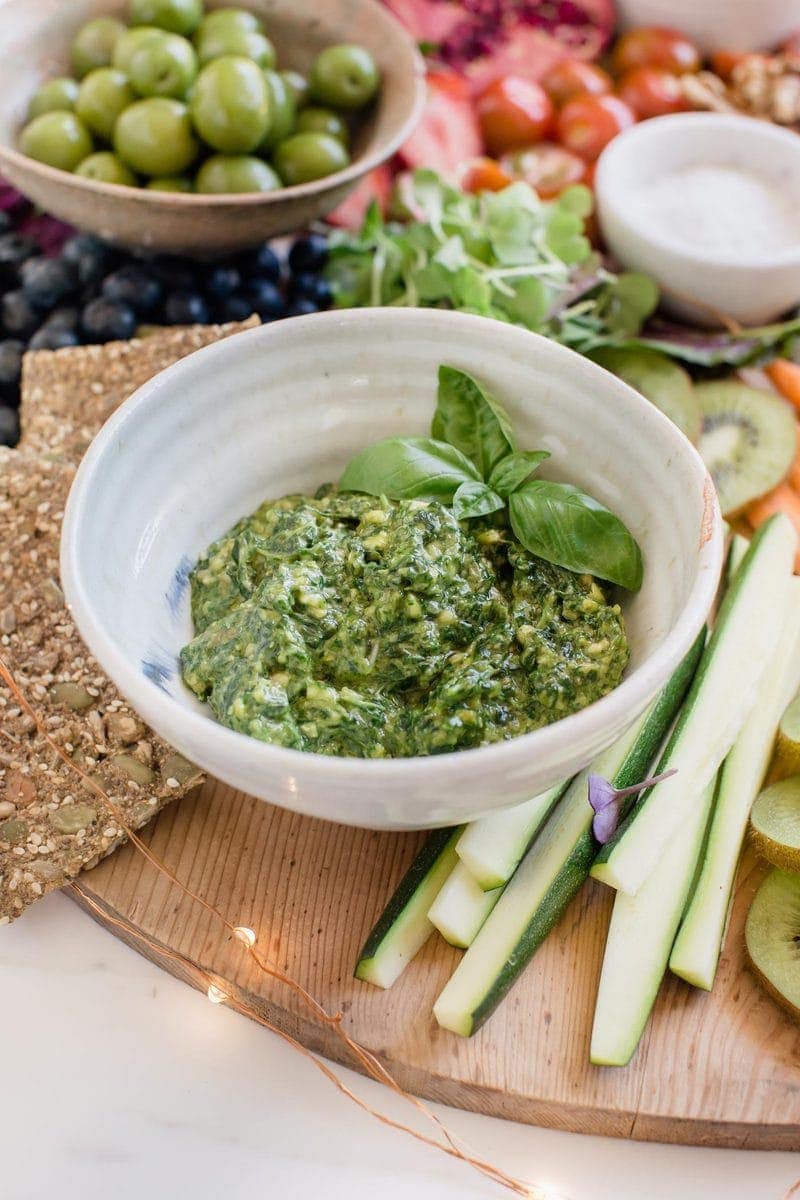 Detail of homemade vegan basil pesto on the vegan platter