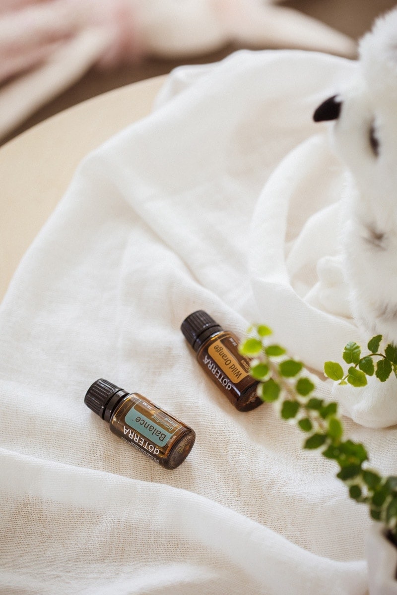 Balance essential oil blend for sleep on a bedside table