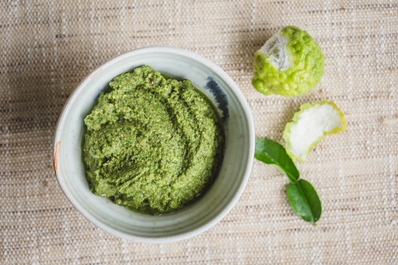 A vegan Thai Green Curry Paste in a ceramic bowl