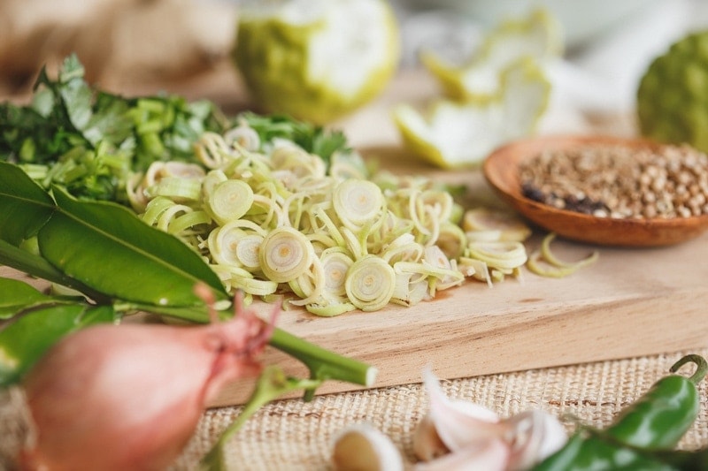 Fresh ingredients for a green paste recipe, chopped and ready to go