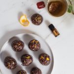 A simple chocolate crackle recipe infused with wild orange essential oil. #chocolatecrackles #chocolatetruffles #essentialoilrecipes #wildorange #doterrarecipes #vegantruffles #easytreats #healthytreats #quickdesserts #healthydesserts #sweetrecipes #sweetideas #AscensionKitchen // Pin to your own inspiration board! //