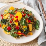 Mango Soda Noodle Salad packed with gently cooked greens and finished with a tangy chilli and lime dressing. #mangosalad #sobanoodles #sobasalad #chillilime #quickdinner #healthydinnerideas #healthymains #vegandinner #veganrecipes #AscensionKitchen