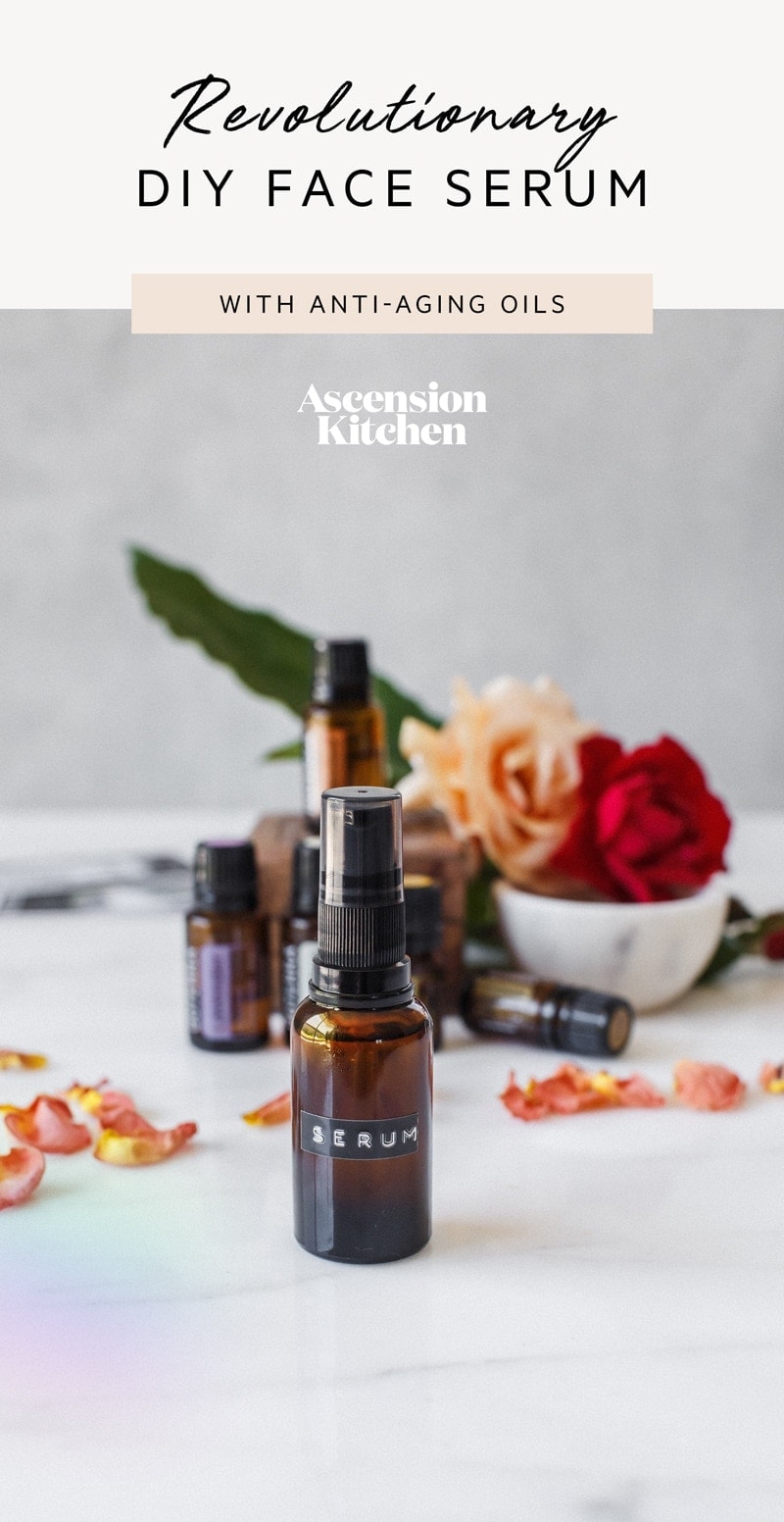 Hero shot of the face serum styled beautifully with fresh roses, the recipe title is written across the top of the image
