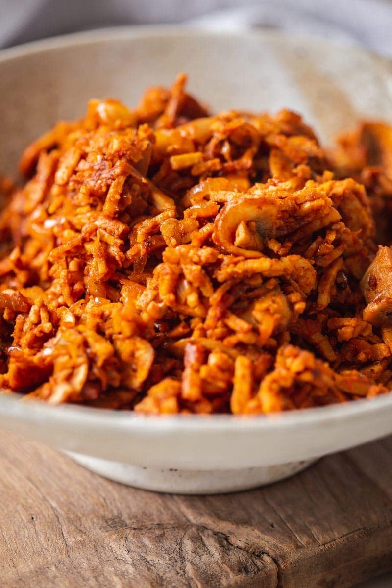 Close up of freshly cooked vegan taco meat in a bowl - it really does look like mince!