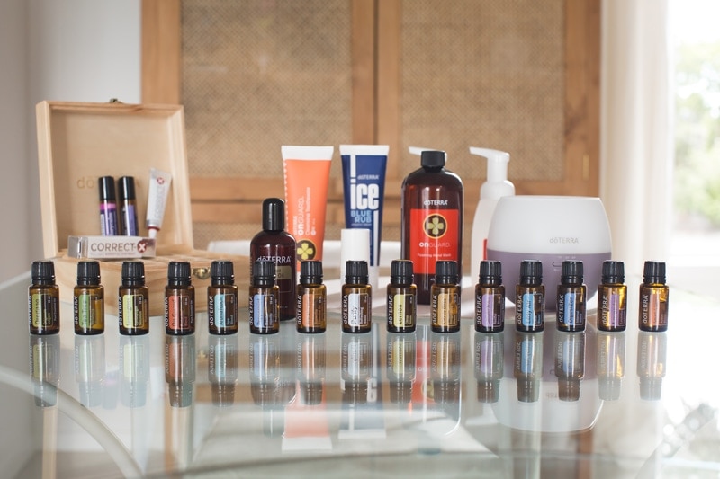 The doTERRA Nature's Solutions Kit laid out beautifully on a glass table