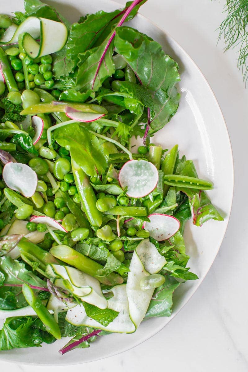 Beautifully styled close up of the asparagus salad showing all the different textures