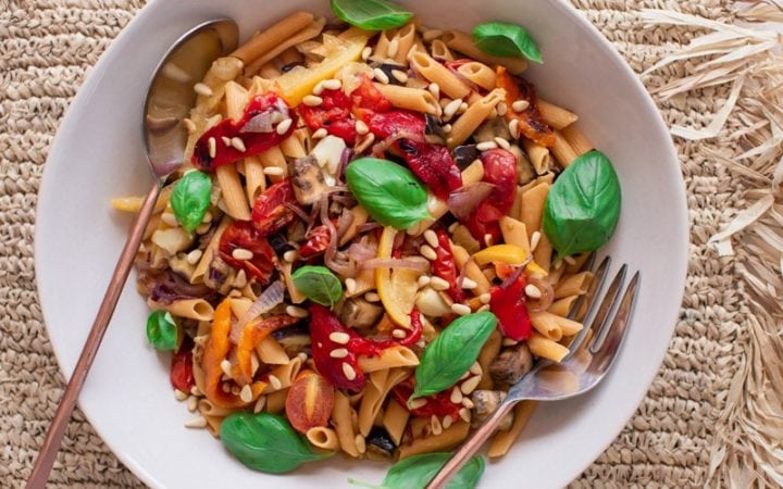Overhead shot of a bowl of healthy pasta salad revealing the colourful inclusions