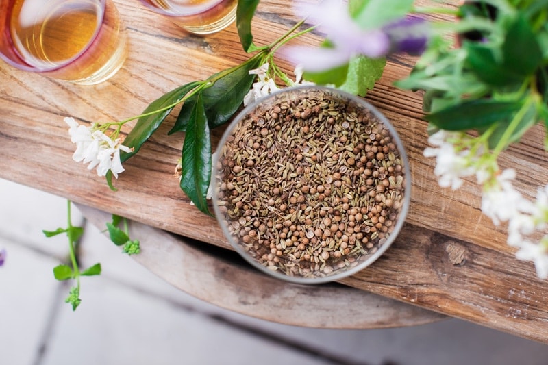 Close of a glass jar containing the three spices that make up the CCF tea blend