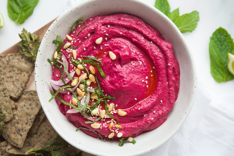 Close up of a red beet Christmas hummus