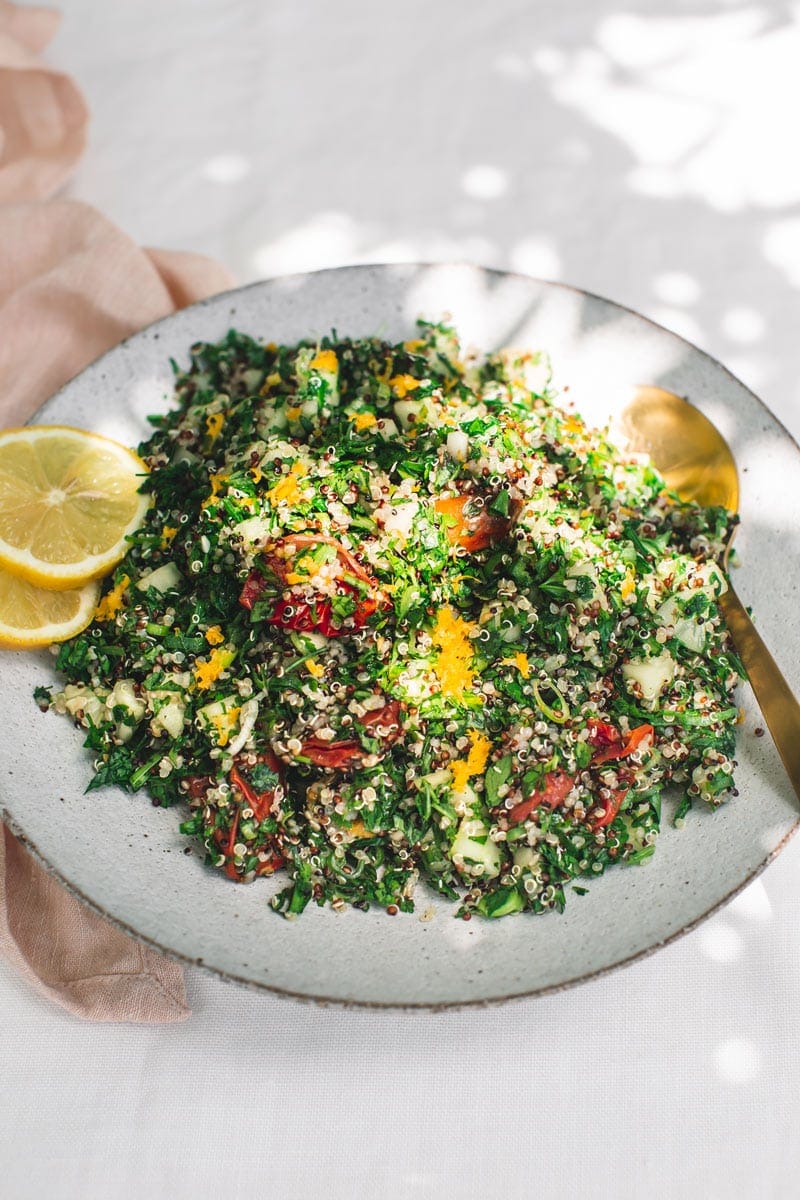 Ceramic bowl filled with fresh tabbouli made from quinoa