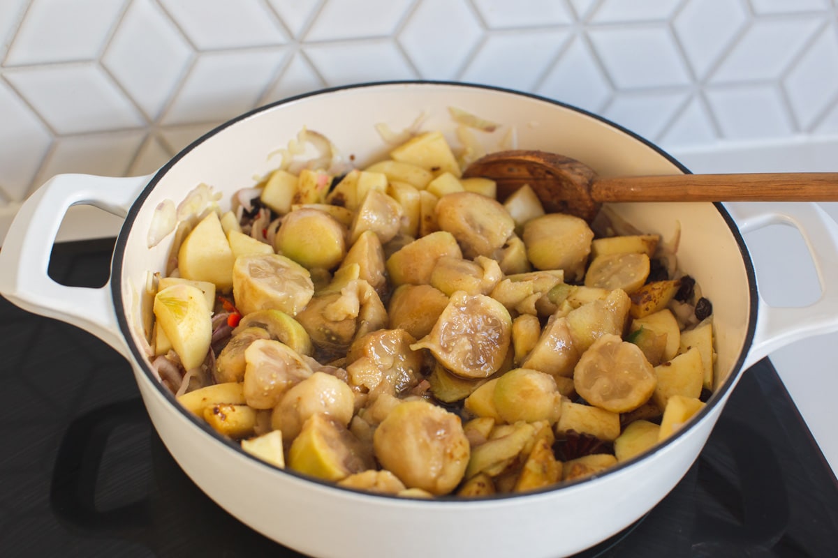 Scooped feijoa fruits, apples and all other ingredients added to the saucepan