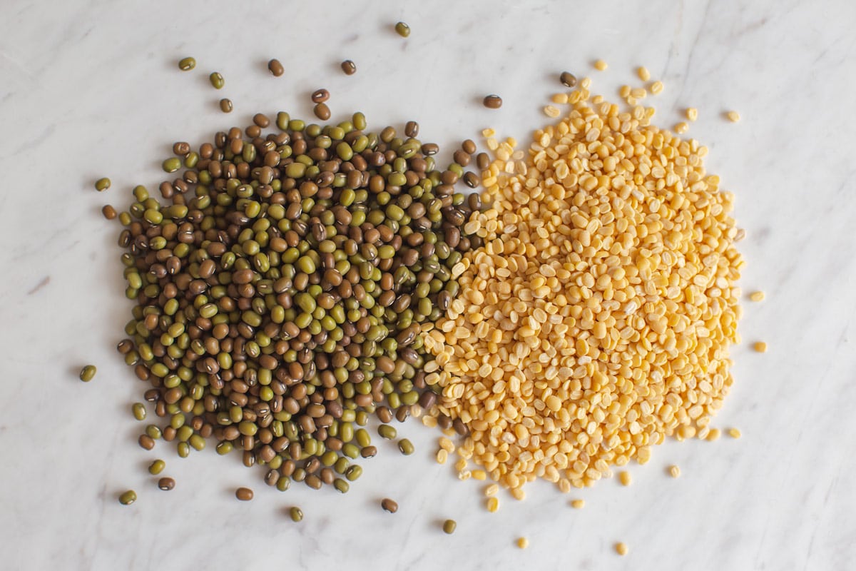 Whole green moong vs split yellow moong dal side by side for comparison. 