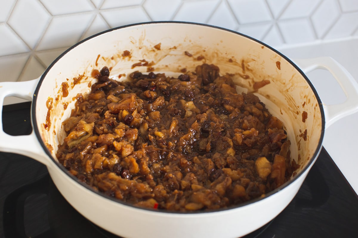 The chutney has reduced down and thickened, it is now a rich brown colour